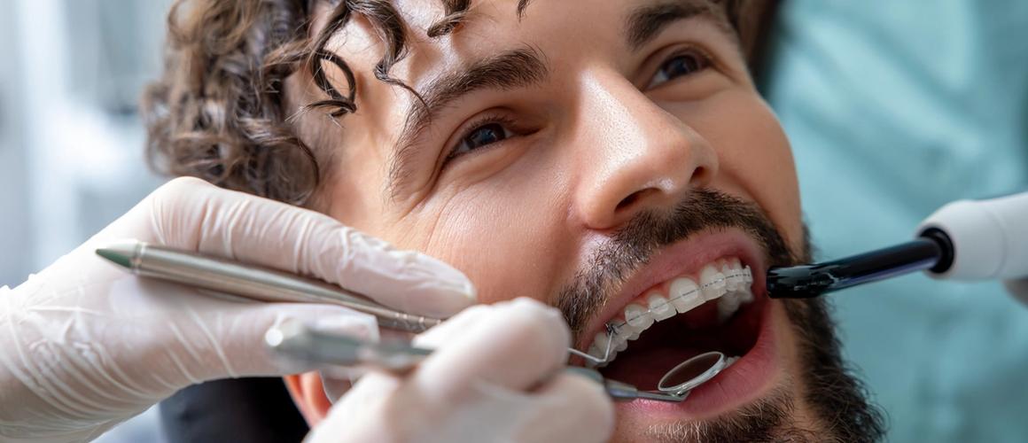 Adult patient with ceramic braces